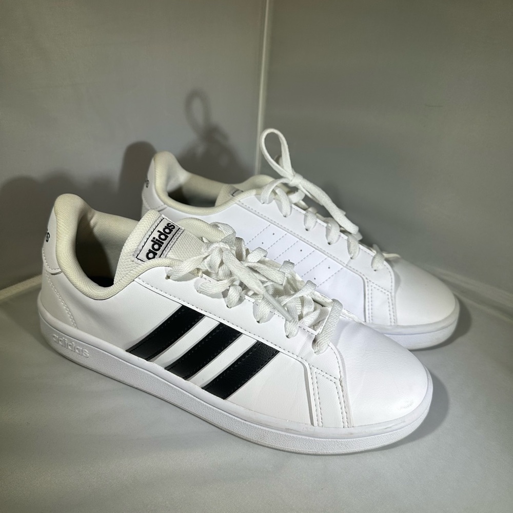Adidas white with black outside stripe